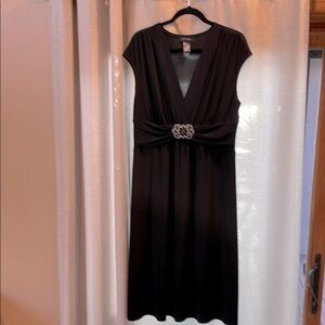 Elegant Black Dress with Embellished Waist